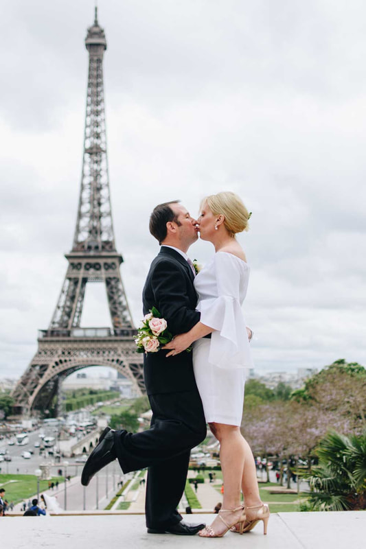 American Vow renewal in Paris in front of Eiffel Tower. 