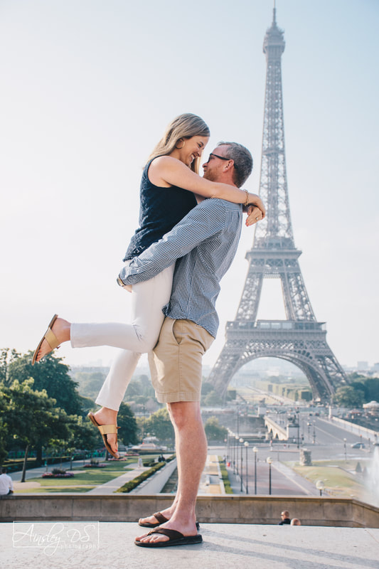 Romantic Eiffel tower maternity announcement photo shoot in Paris, France by New Zealand Photographer. 
