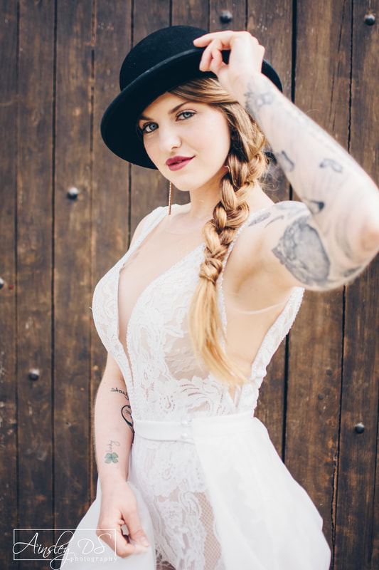 Model wears bridal pantsuit photographed by Auckland based portrait photographer Ainsley Ds 