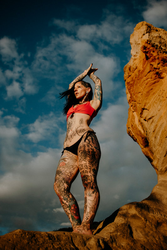 Tattoo woman on beach in West Auckland, body positive photography by Ainsley DS