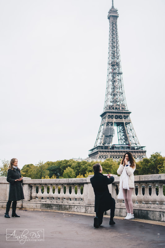 An emotional surprise proposal photoshoot in Paris by photographer Ainsley DS Photography 