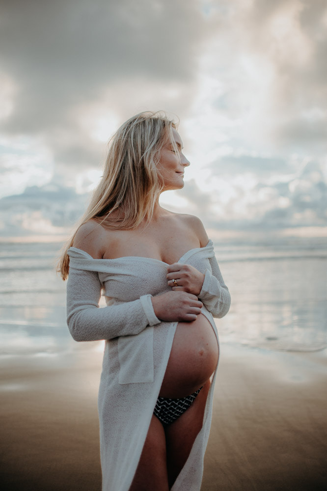 Auckland maternity shoot on west coast beach at sunset with Ainsley DS Photography 